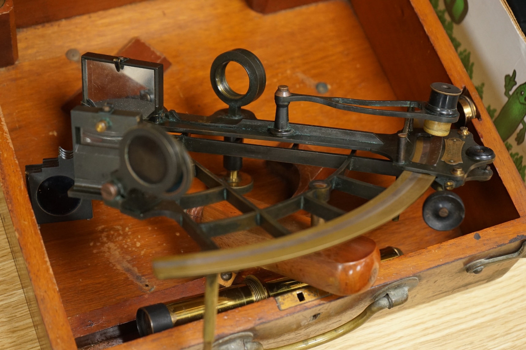 A 19th century mahogany cased sextant by Heath & co Ltd., New Eltham, London, in a fitted case with card label for the Hezzanith Observatory Works